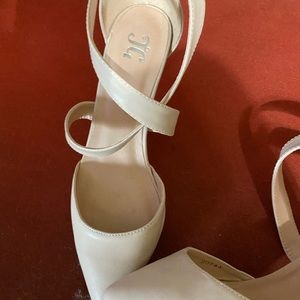 Strappy beige heel , small heel . Never worn